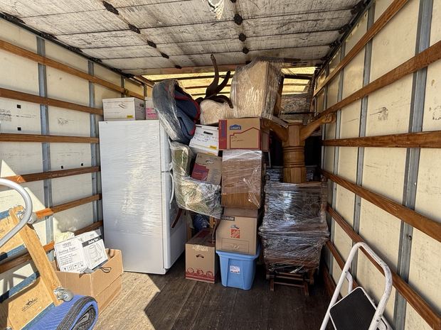 Furniture and boxes being organized for transit